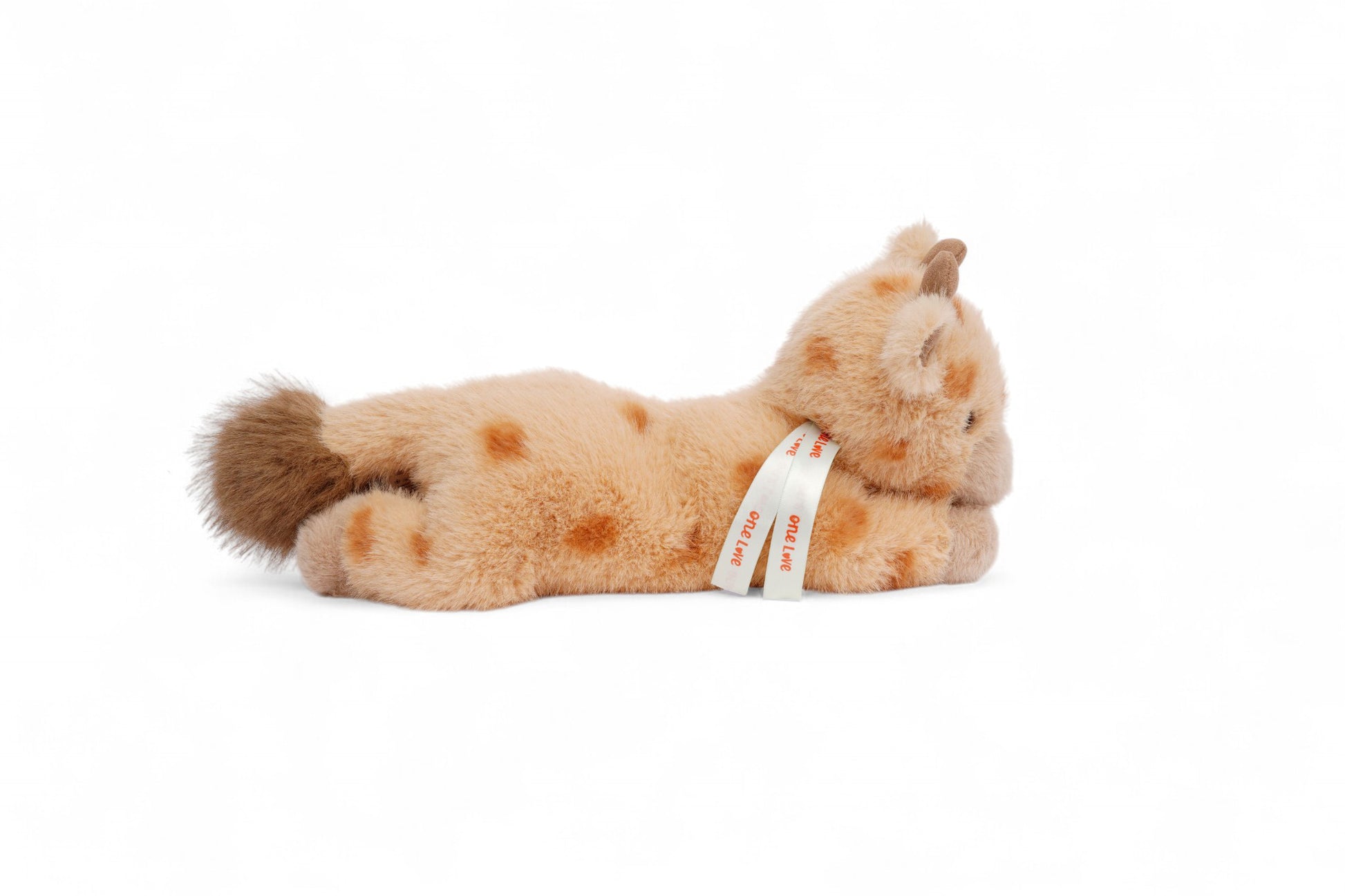 One Love Willow the Giraffe plush companion side profile view