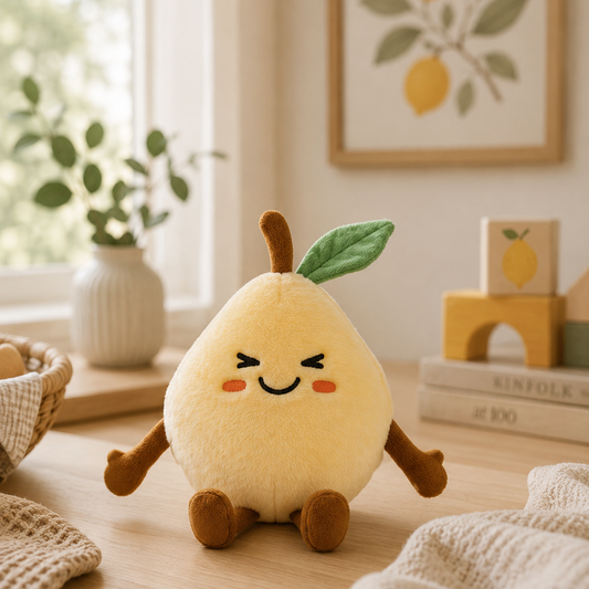 Besitos Lemon plush toy sitting on a wooden table in a warm neutral nursery with Scandinavian décor and soft natural light.