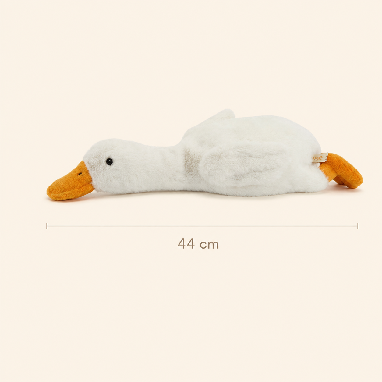 Side view of One Love Snuggles Feather Goose plush toy showing its 44 cm length